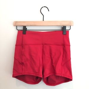 Red Lululemon shorts